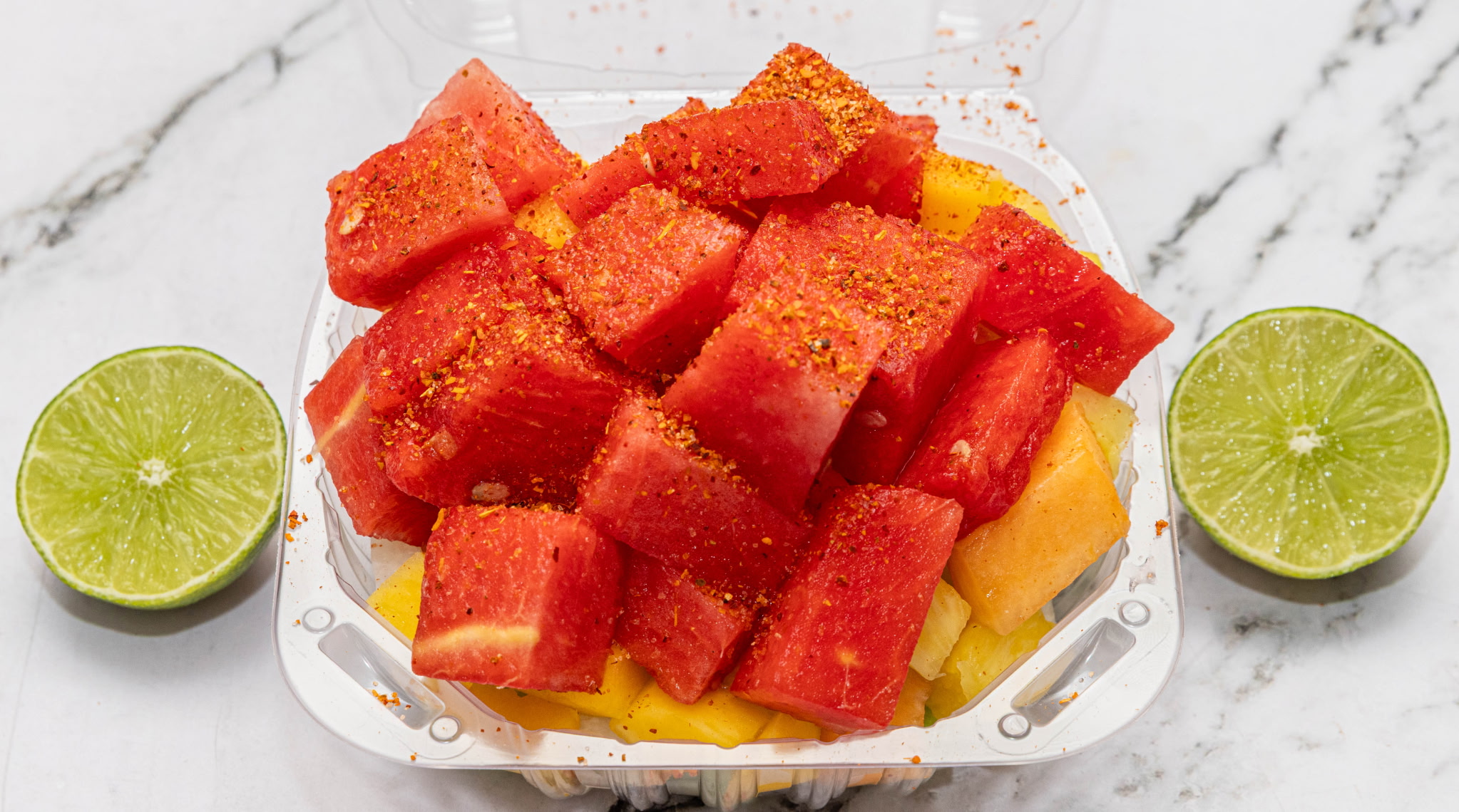 Fresh watermelon and mango with tajin and lime