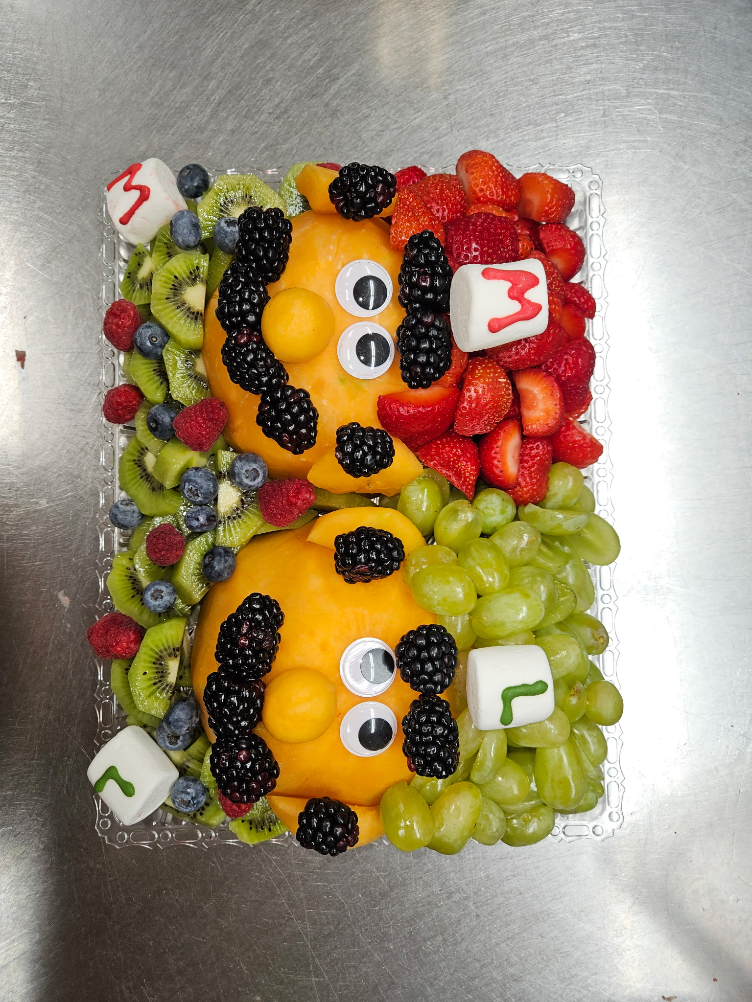 Monster-themed fruit arrangement