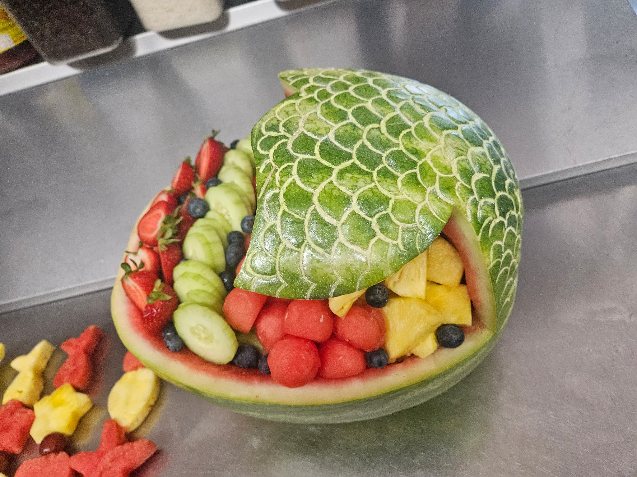 Carved watermelon basket with fresh fruit