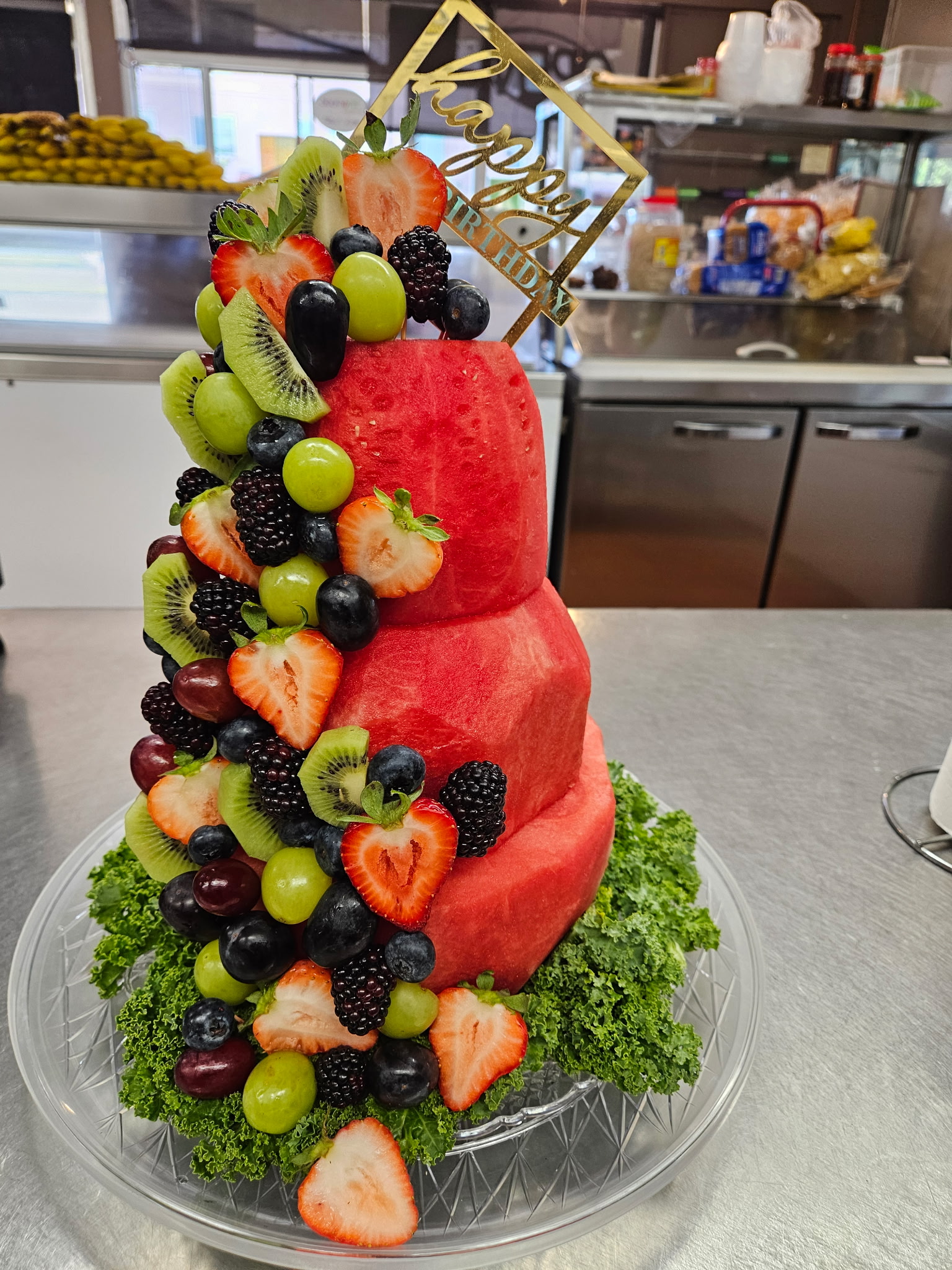 Watermelon birthday cake with fresh fruit