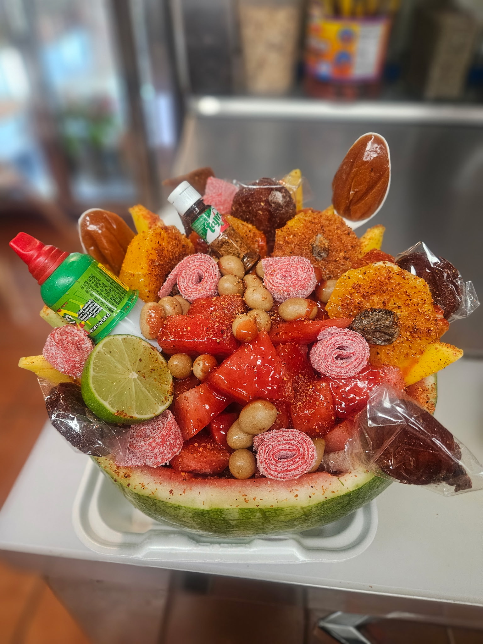 Watermelon bowl with Mexican candy and chamoy